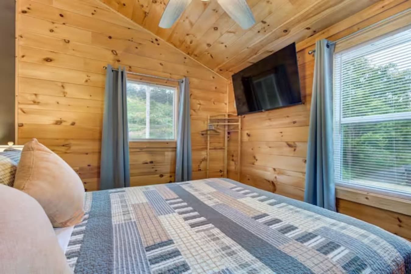 Morning Sunlight: Wake up to soft light filtering through the trees in this restful retreat.