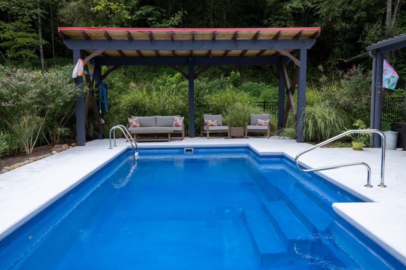 Lounge in Style: Plenty of poolside seating for those who prefer to soak up the sun.
