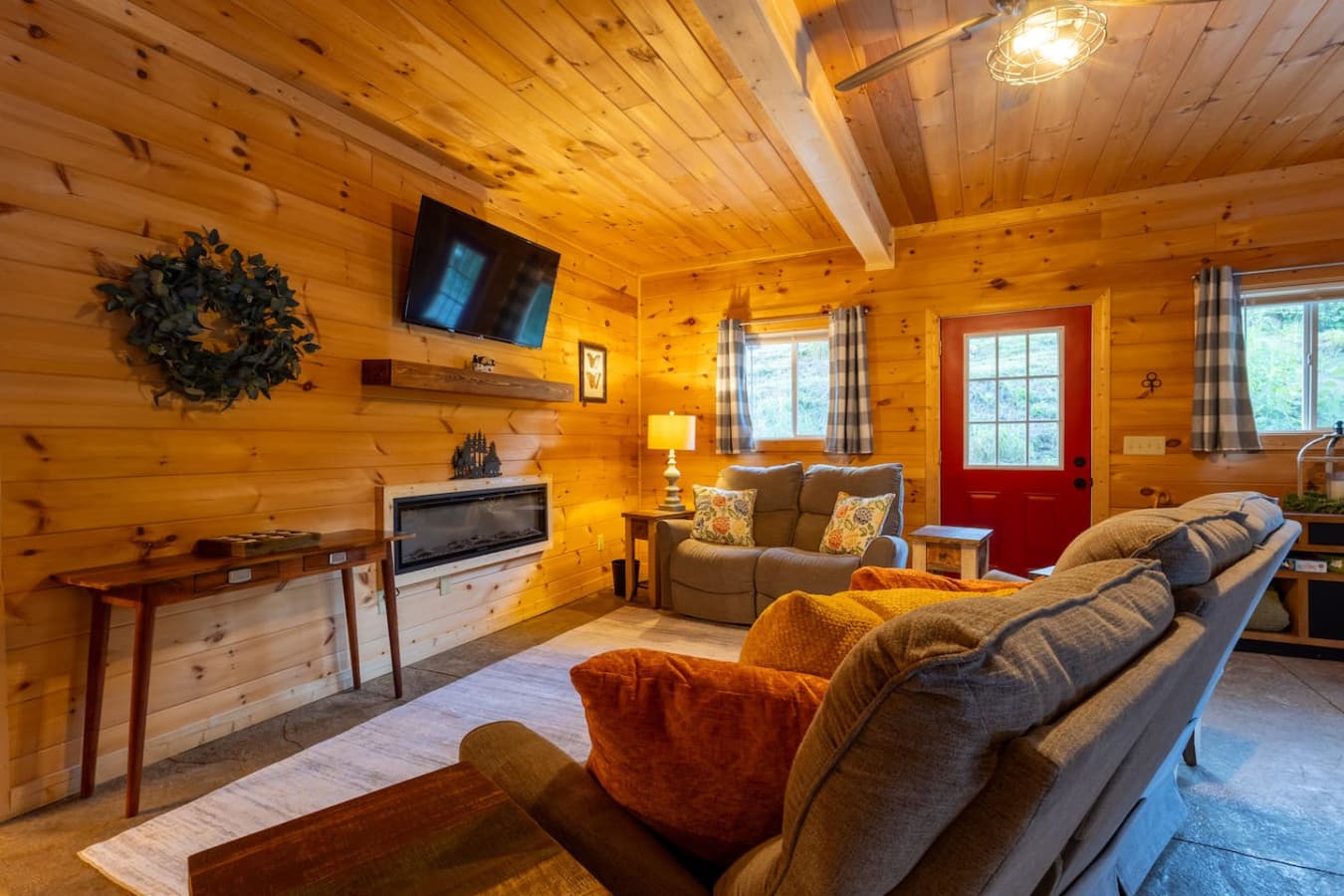 Cozy Up by the Fire: Sink into plush seating and enjoy the warm, mess-free glow of the indoor electric fireplace.