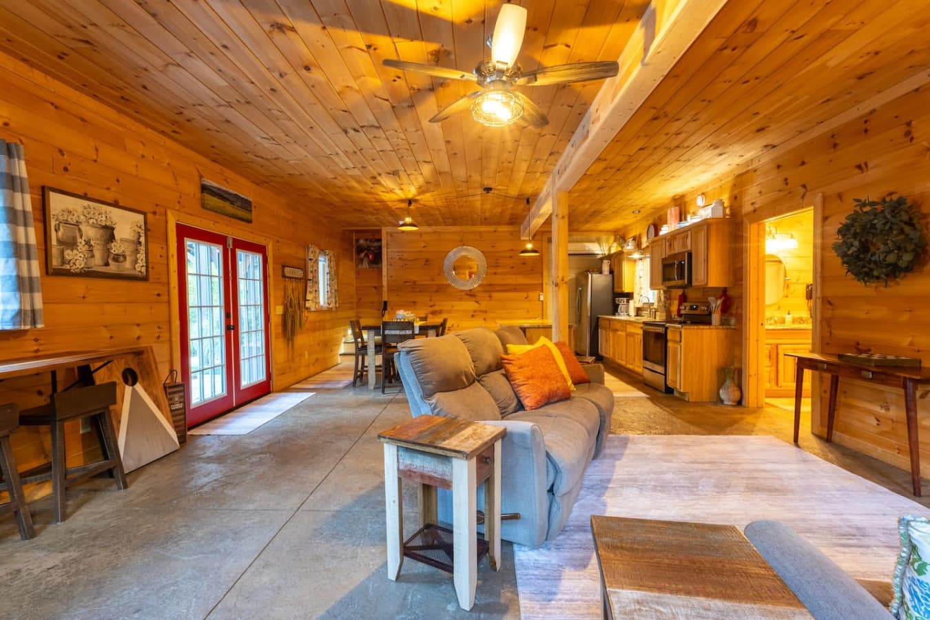 Bright & Airy: Large windows frame rolling valley views, filling the main lounge with natural light.
