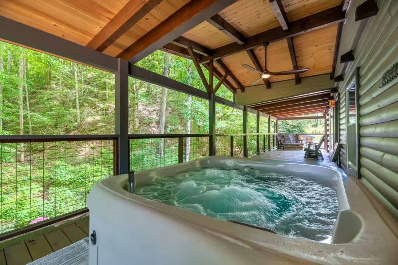 The ultimate mountain luxury: a warm soak under the vast Smoky Mountain sky.