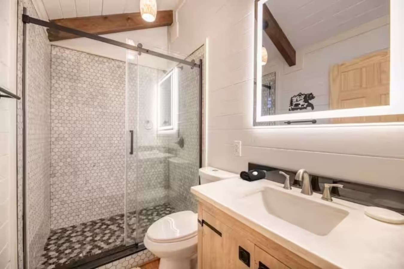 A spacious second bathroom, ensuring everyone has plenty of room to get ready.