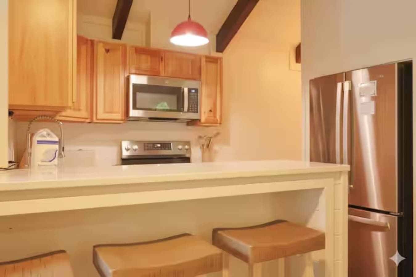 Bright and airy cooking space with modern appliances and plenty of room for the "designated chef."