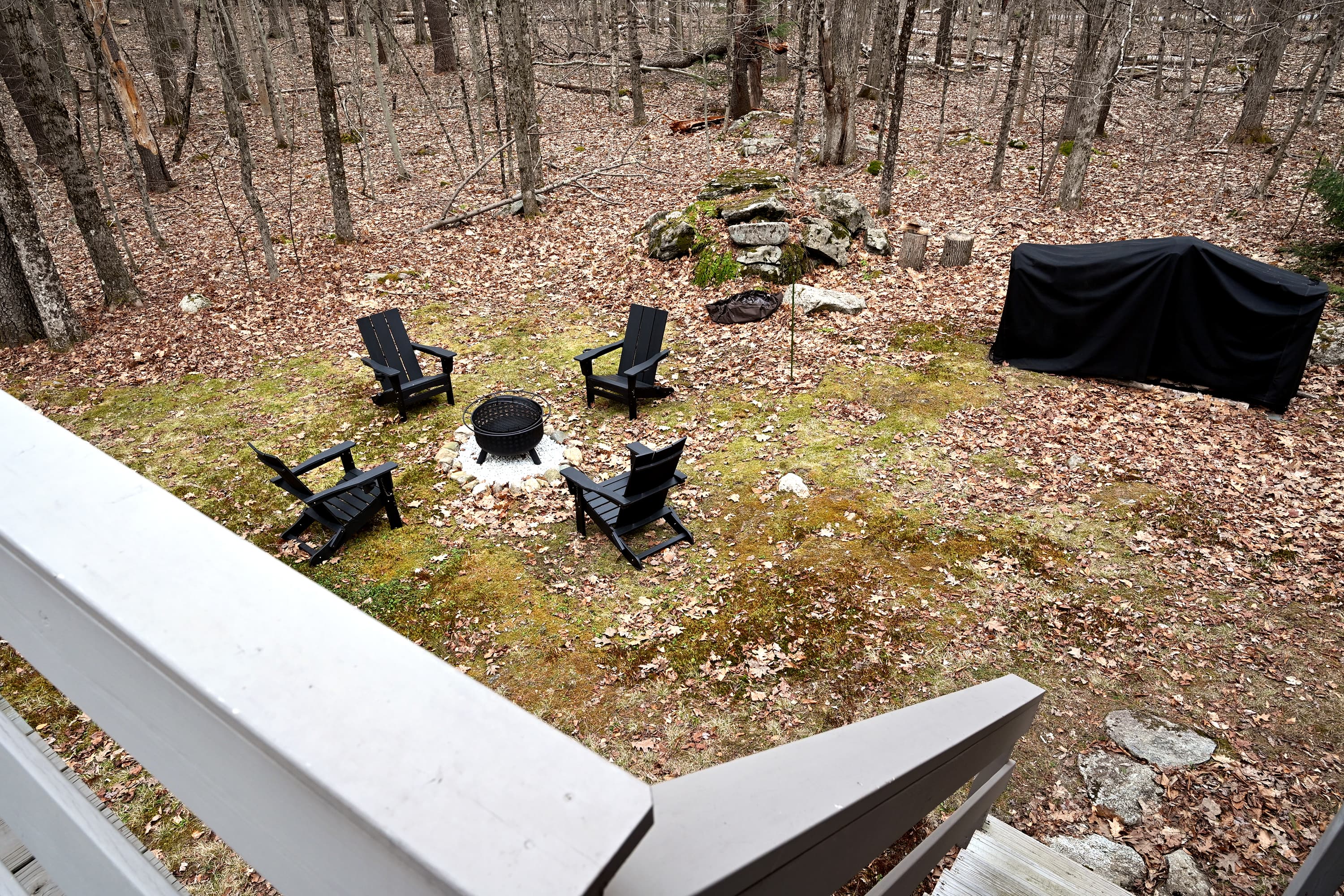 Enjoy a conversation around the firepit out back.