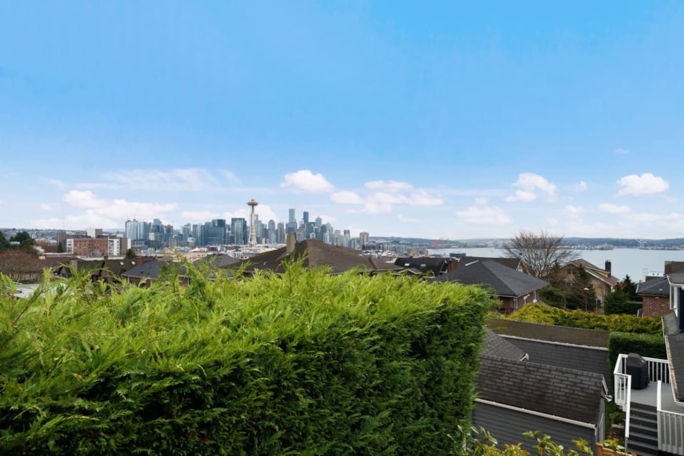The stunning view of Seattle, featuring the iconic Space Needle, the city skyline, and the waterfront in the background