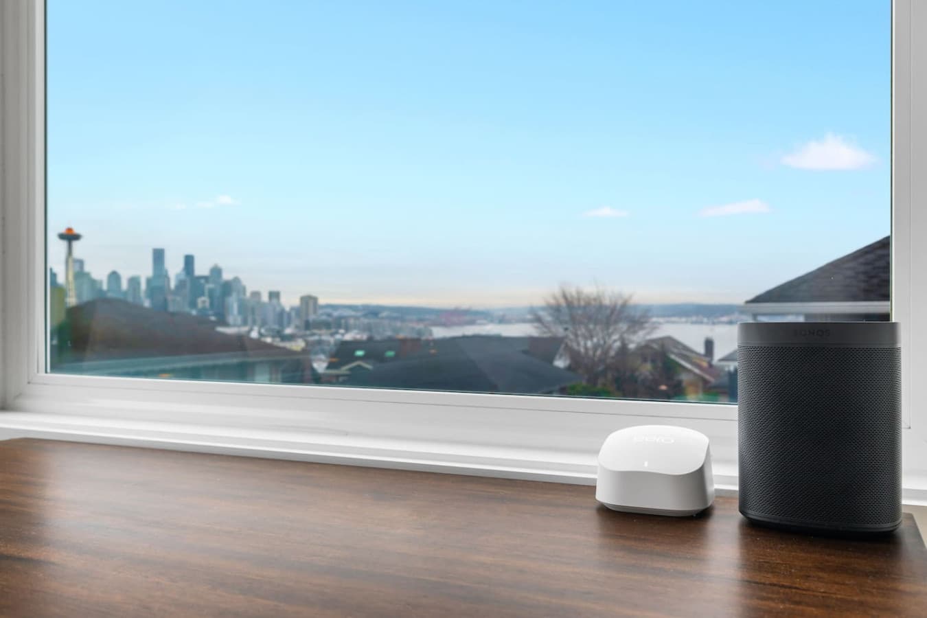 UPSTAIRS - MASTER BEDROOM: In the second bedroom, you'll find a Sonos One Smart Speaker Set of 2 Wi-Fi smart speakers with Alexa voice control, along with an Amazon eero 6 mesh Wi-Fi router. Enjoy the view of the Space Needle from here.