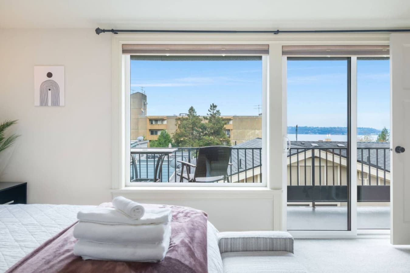 The master bedroom has access to the balcony with an amazing view.