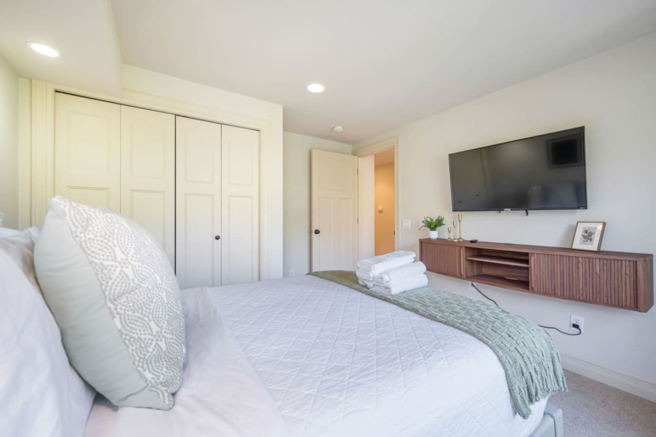 Smart TV, plush bed, soft linens, and warm lighting—perfect for relaxing after a day of exploring. Enjoy access to major streaming services for endless entertainment.