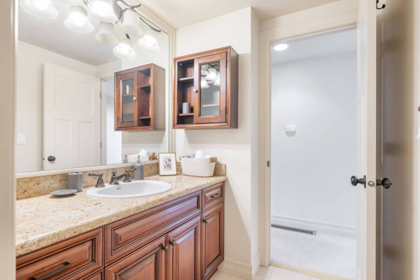 BATHROOM: This central bathroom offers ample storage and counter space, and a bathtub/shower combo. Guests enjoy complimentary toiletries, a hairdryer, and shower gel.