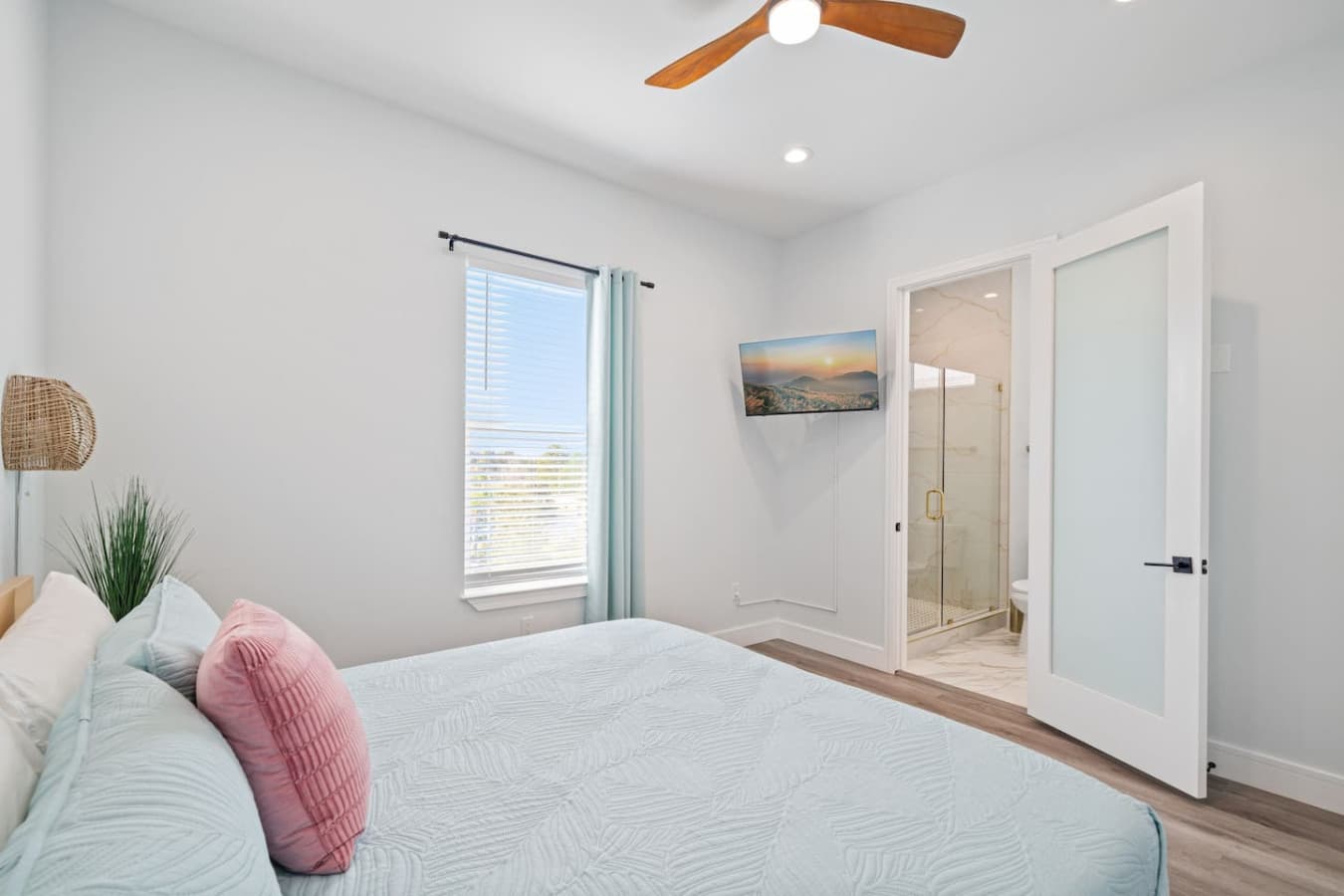 King bedroom located upstairs in the home with en suite bathroom