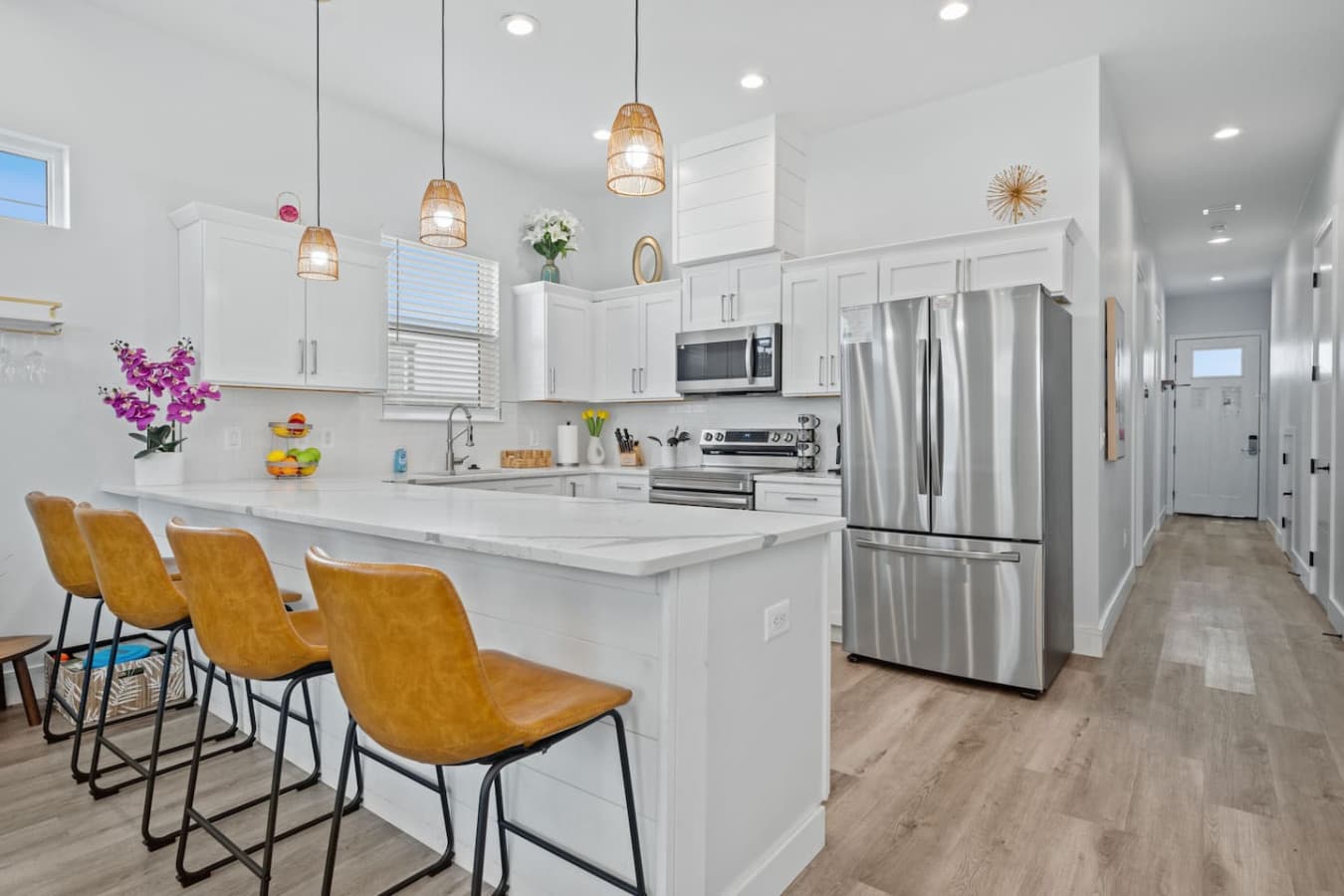 Towards the back of the home is the modern kitchen