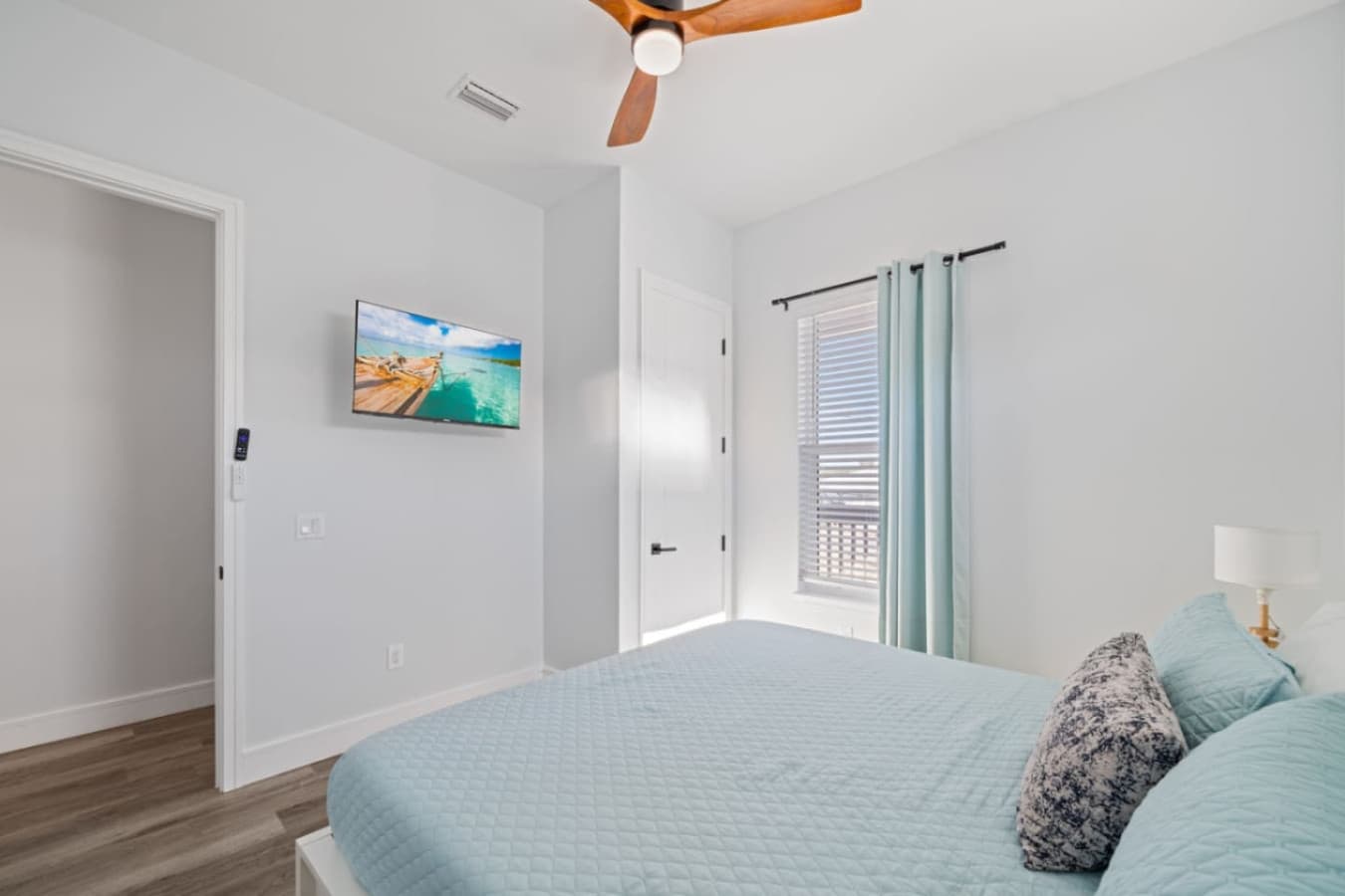 Master King bedroom upstairs with large smart TV