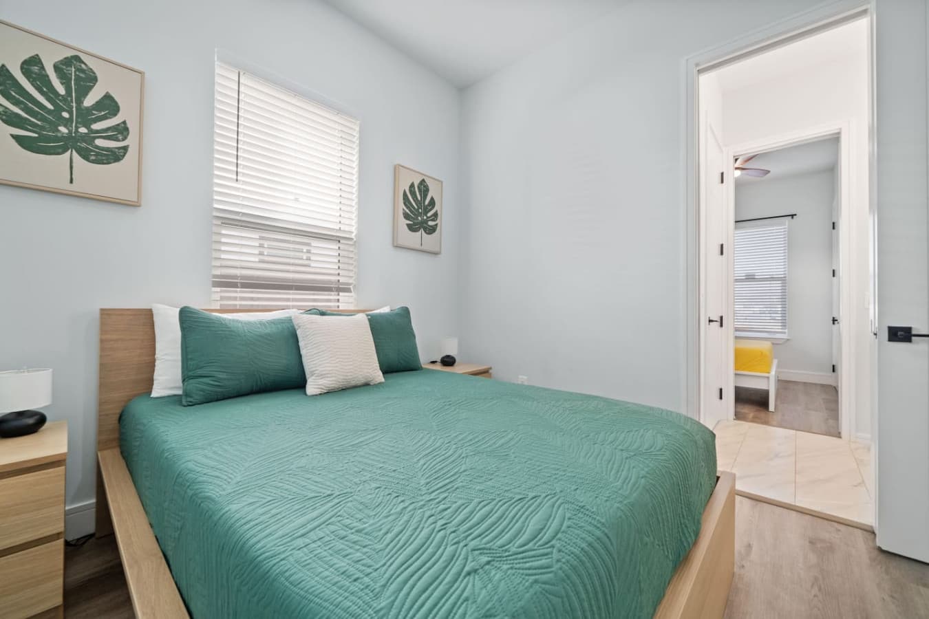 Queen bedroom downstairs with a jack and jill bathroom