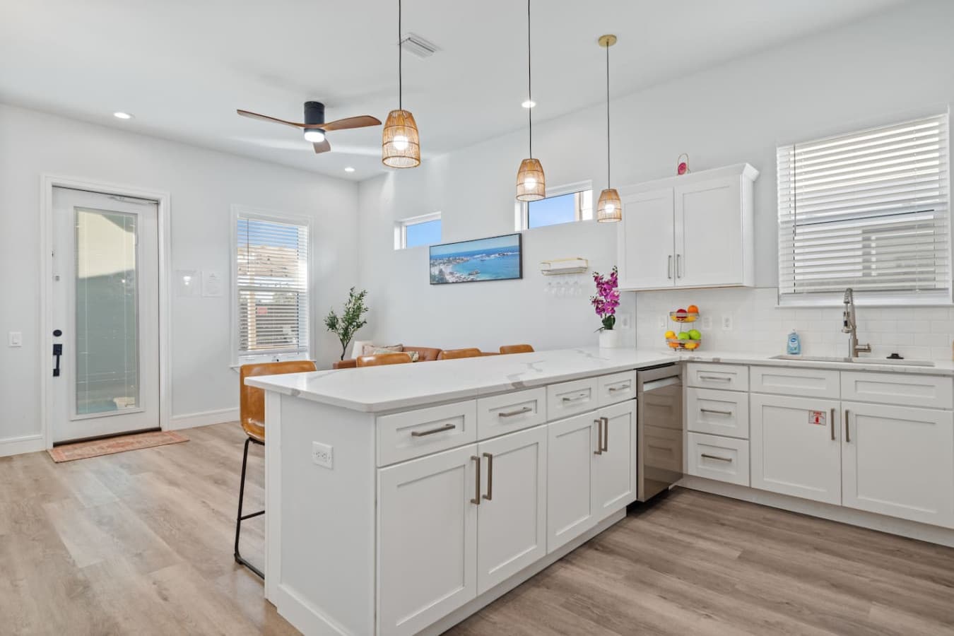An open floor plan where the kitchen flows into the dining area and living space