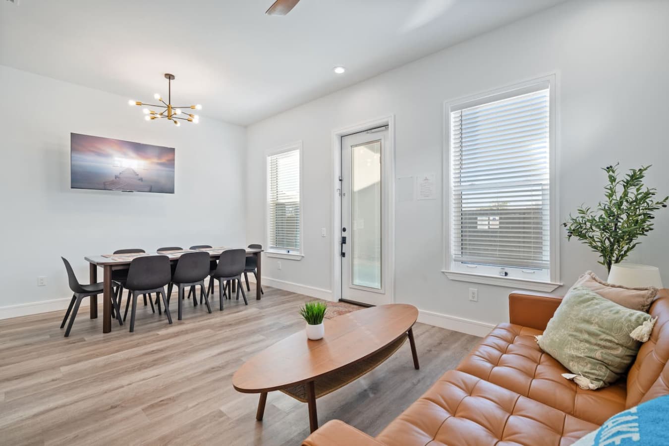 An open floor plan where the living room flows into the dining area and kitchen
