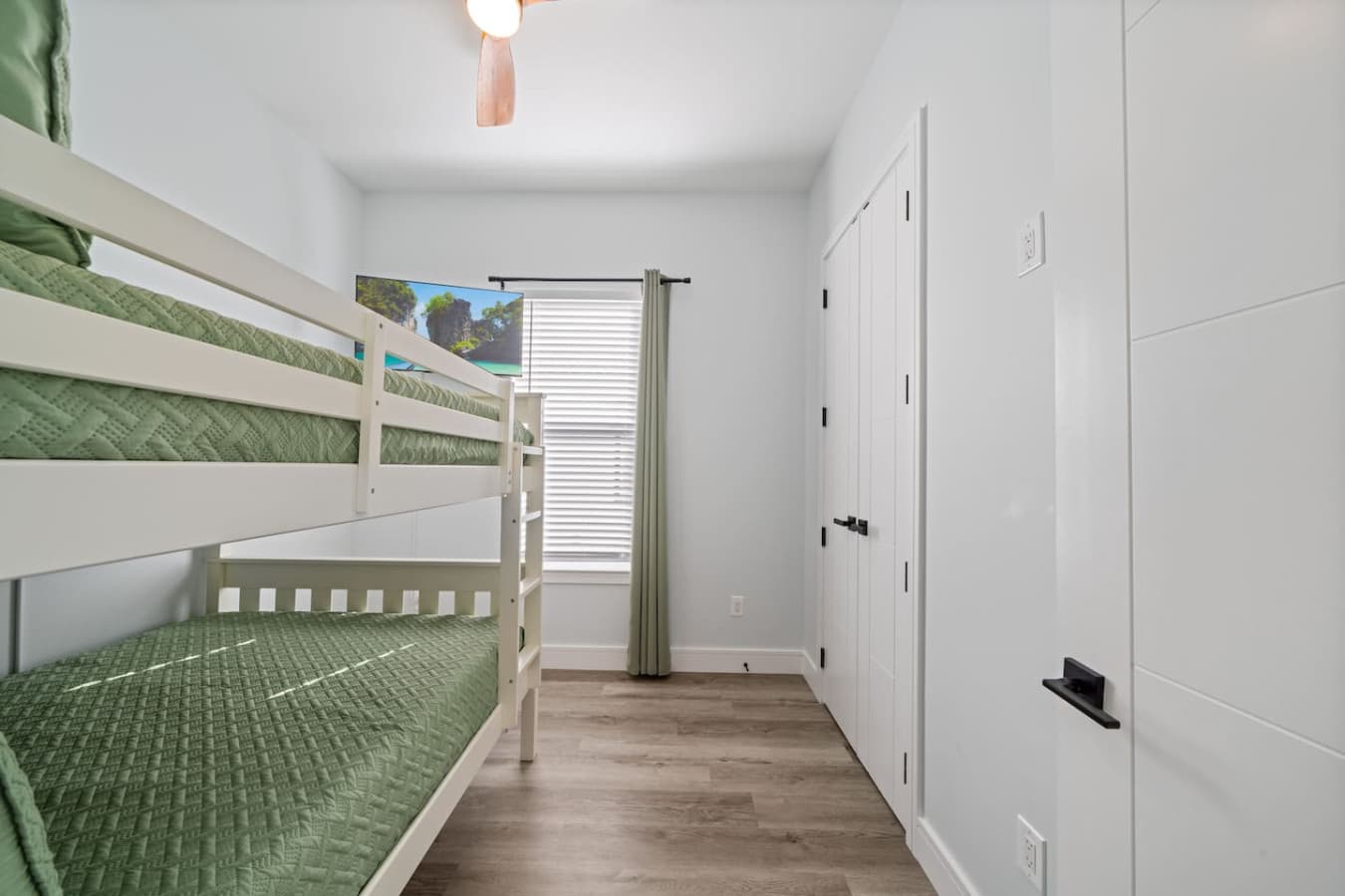 Double bed bunk room located upstairs off the common area complete with a full closet!