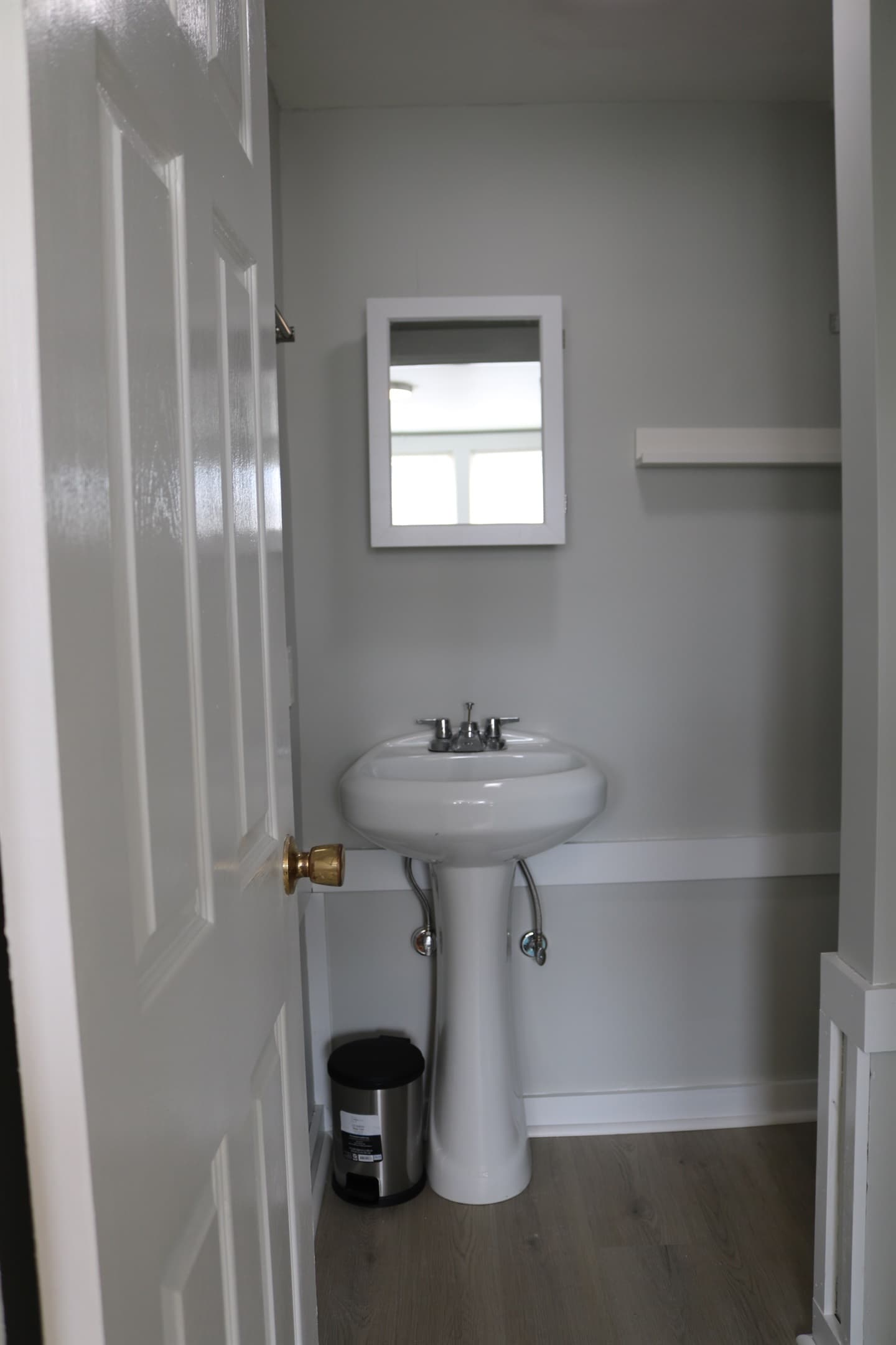 bathroom complete with sink and medicine cabinet