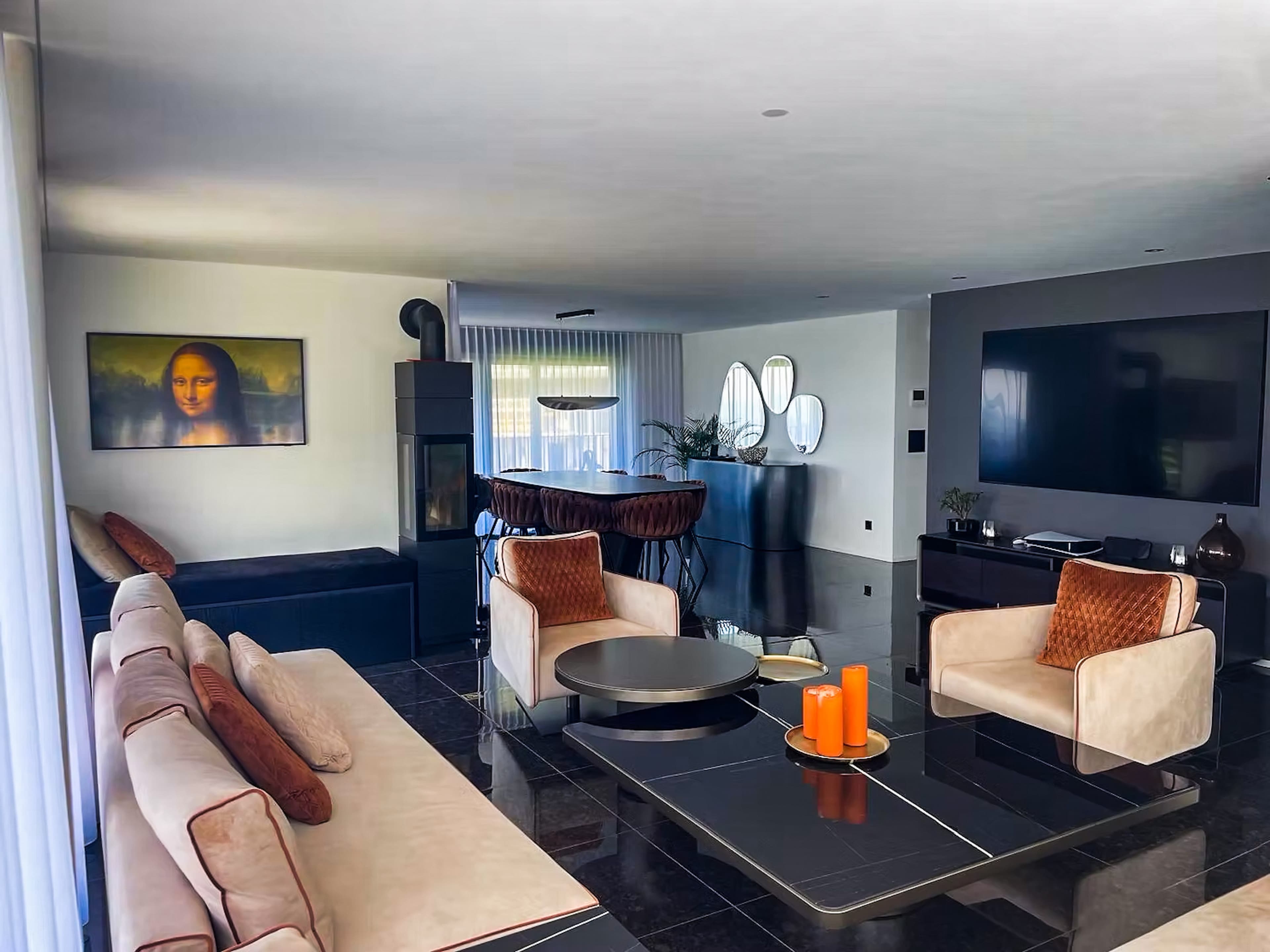 41 villa-tauris-emmetten-lounge-kamin-wohnbereich