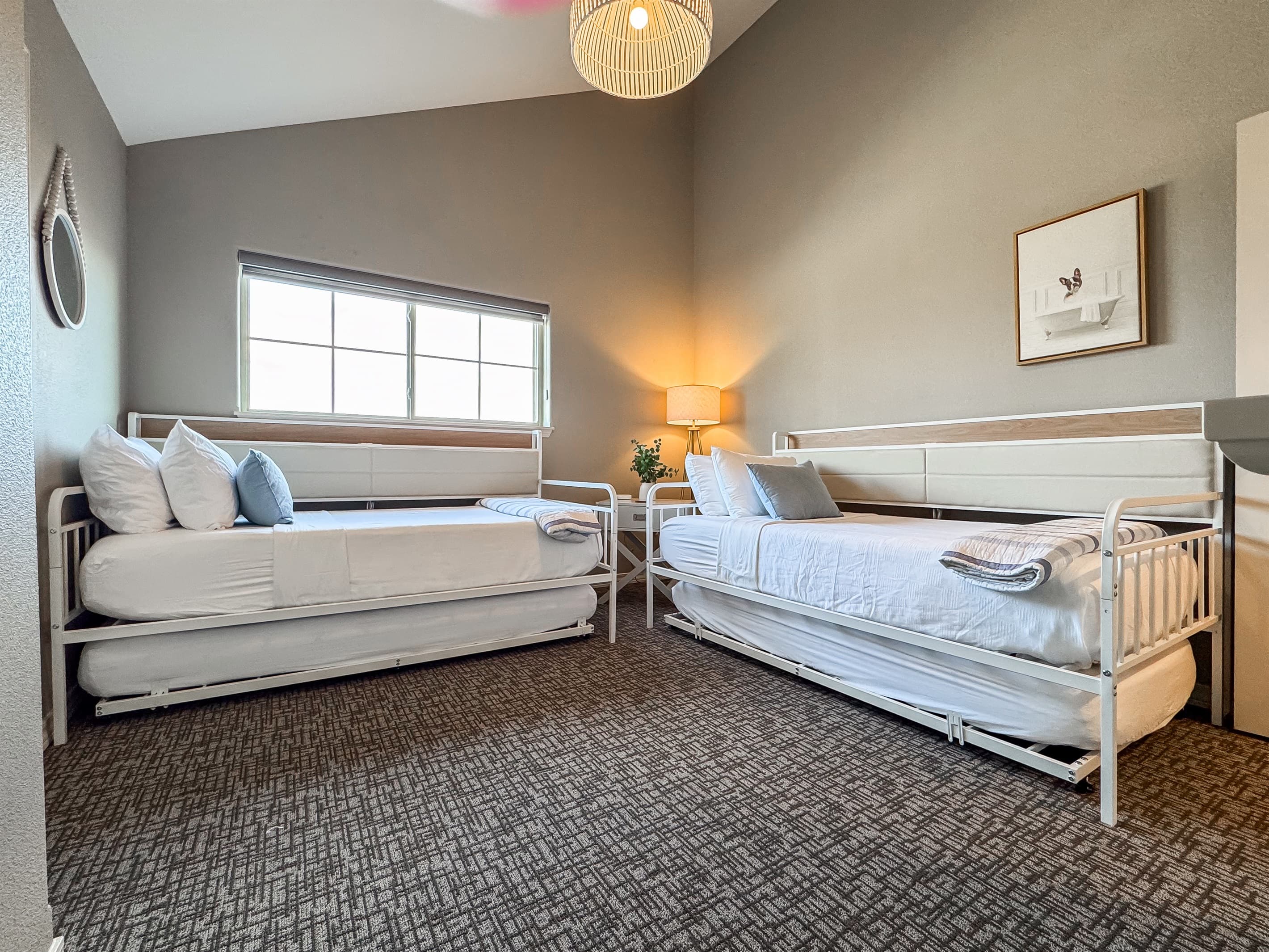 Upper level bedroom with (2) XL twin daybeds and (2) XL twin trundles