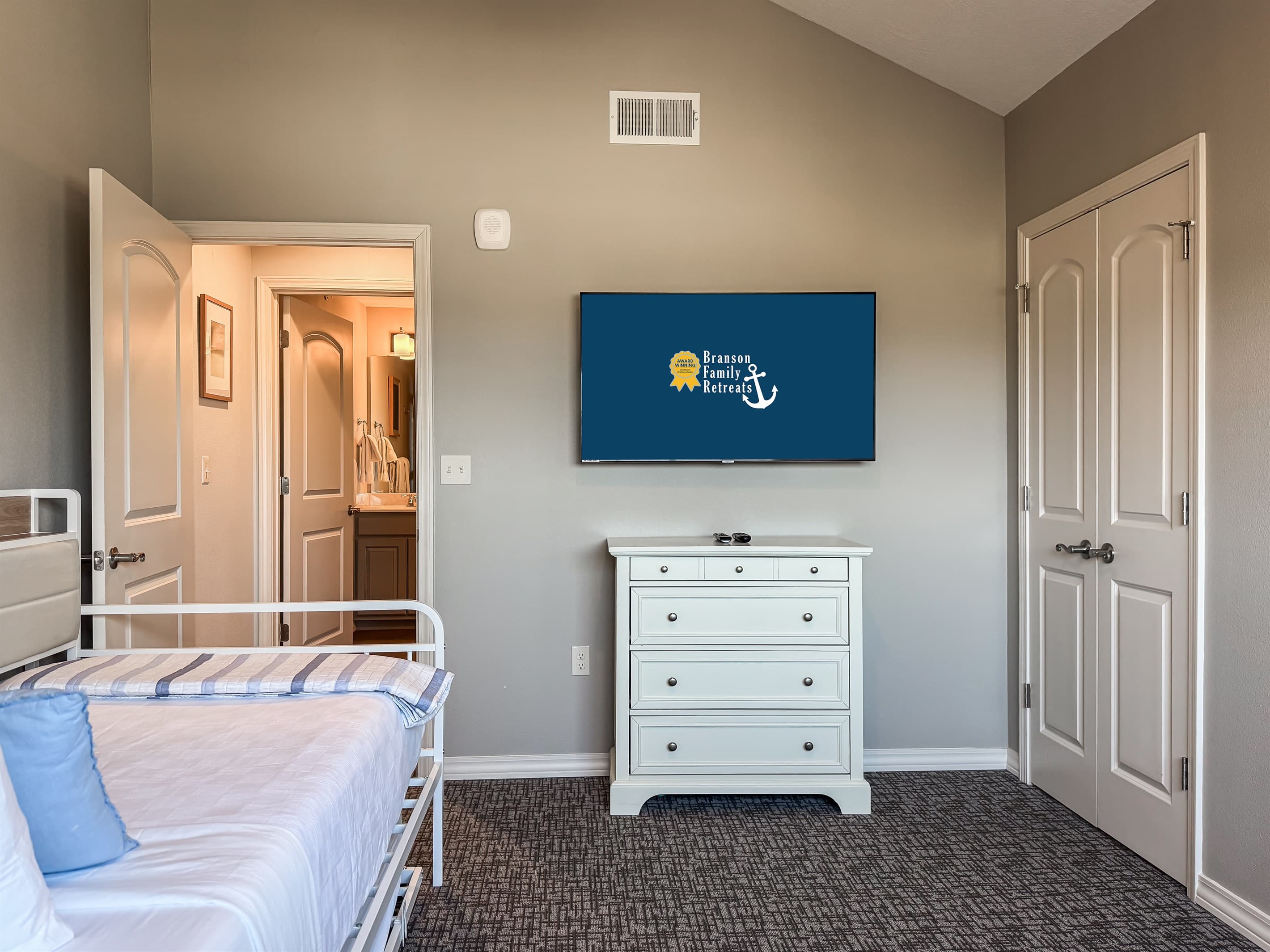 Upper level bedroom also has a flat screen TV and the full bathroom with tub/shower directly across the hall