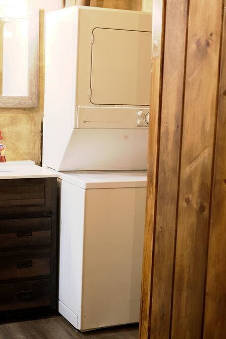 Washer & Dryer is located in the bathroom.