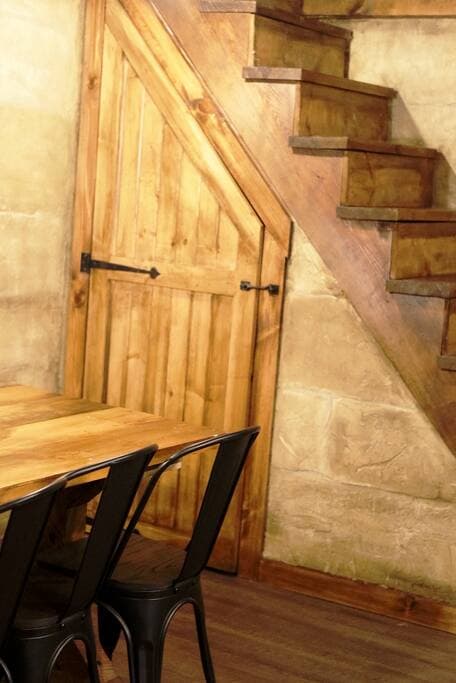 Towels, broom, ironing board etc is located in the storage under the steps in the basement. 