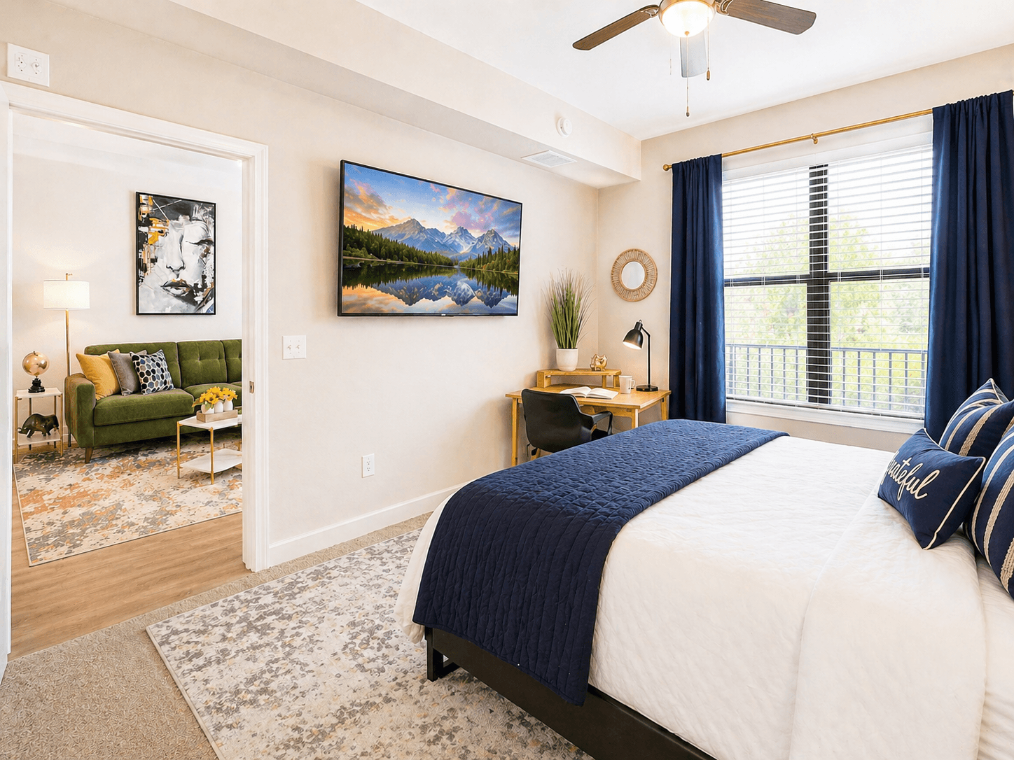 The bedroom sits off the living room with a door for privacy, blackout curtains for a good night's sleep, and its own Smart TV for watching your favorite shows from the comfort of bed. The bedroom overlooks the quiet, peaceful central courtyard.