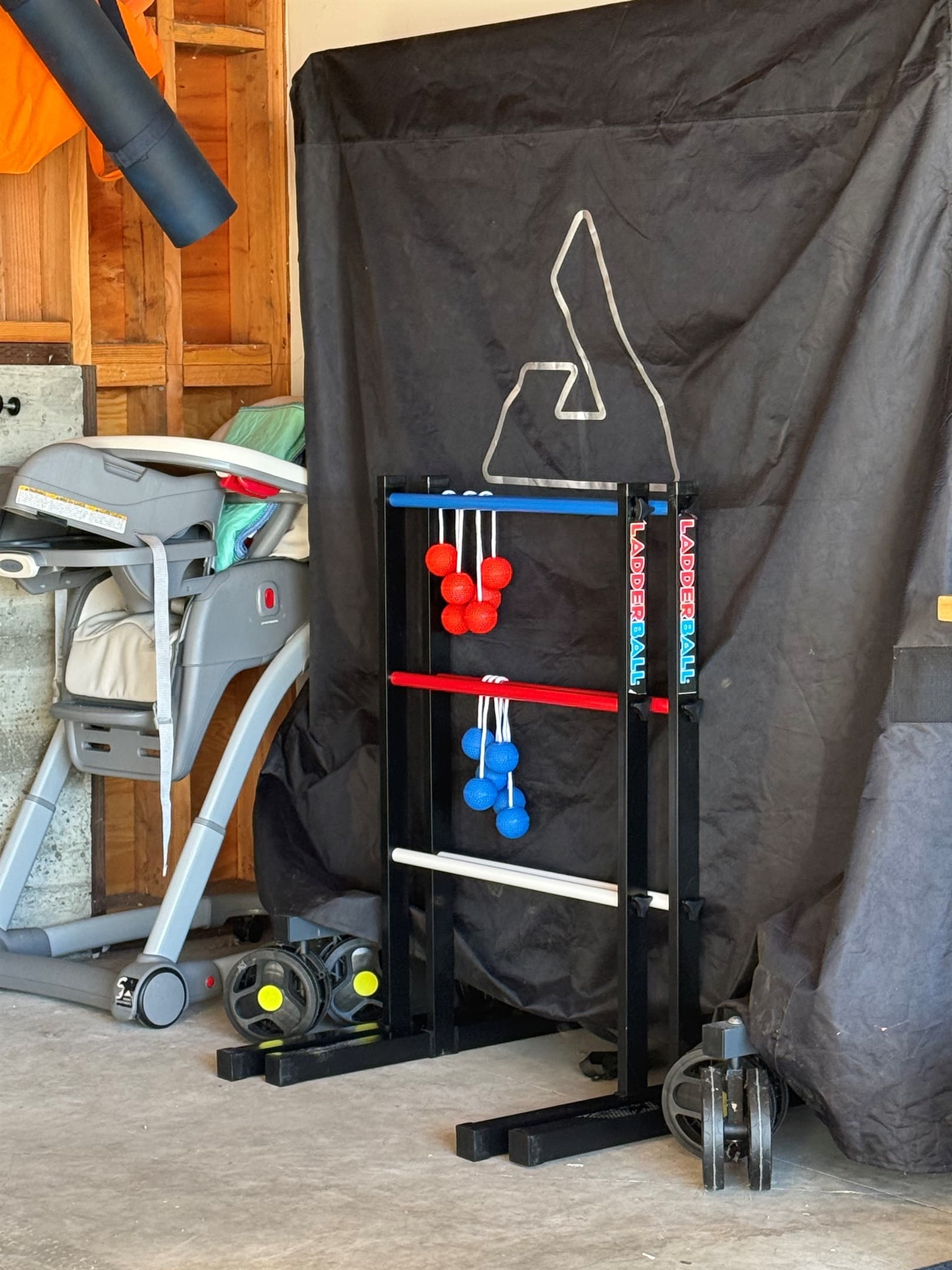 Fun for the kids (little and not so little) -Ladder Ball (or Ladder Golf). Ping pong table is stored behind and highchair is available for use.