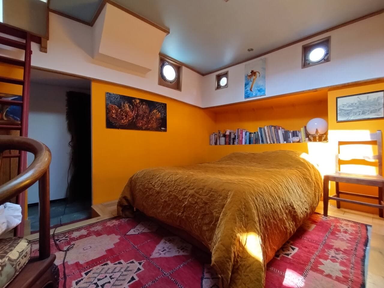 This room has a sofa bed which is very comfortable.  The room is divided from the saloon by large thick curtains.   There is an antique writing desk in the room that can be used for remote working etc.