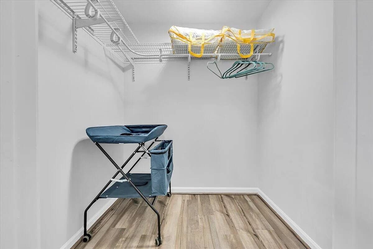 Changing station and crib in upstairs bedroom