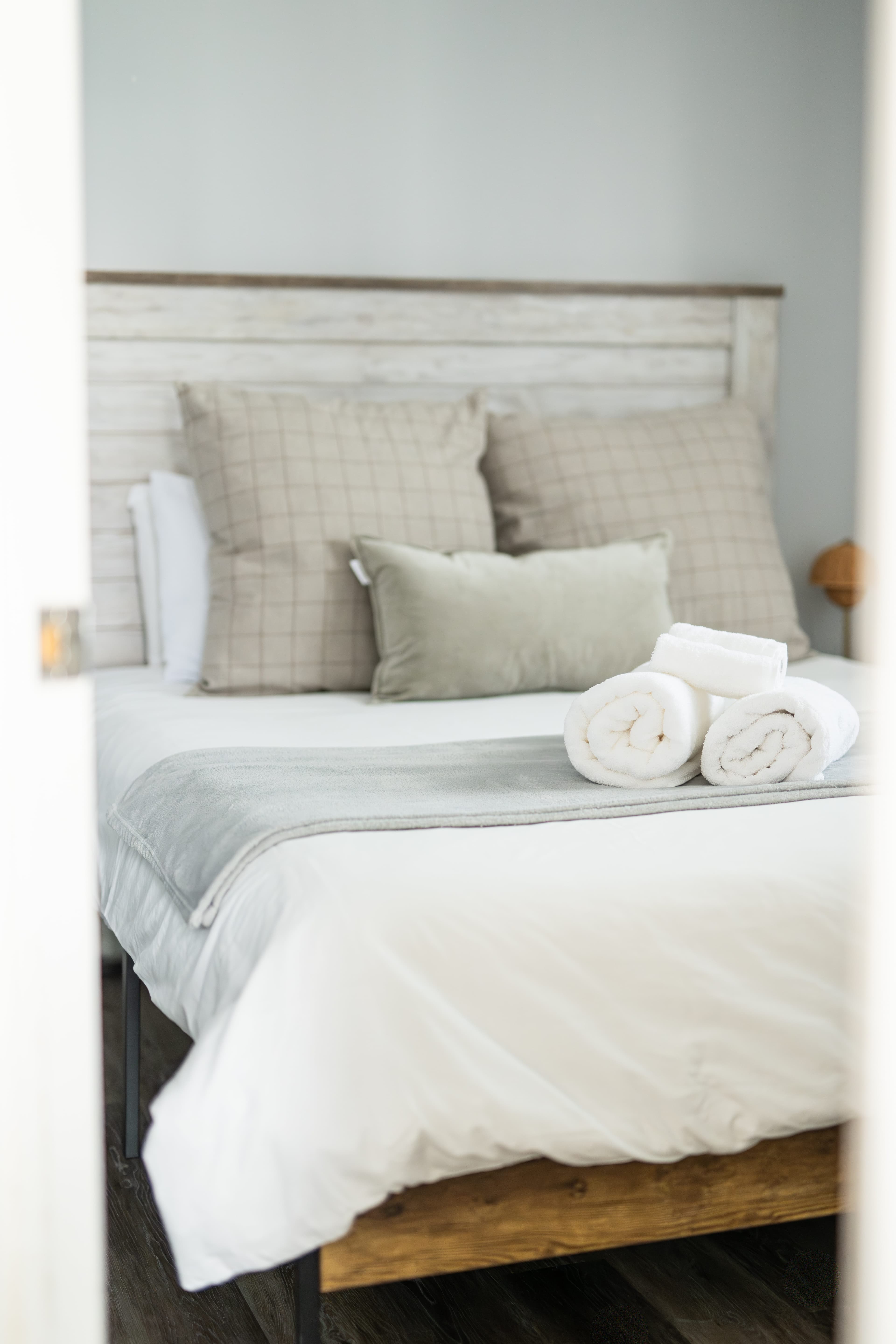 A Double Size Bed with 100% cotton fresh linens and extra pillows for a comfortable sleep