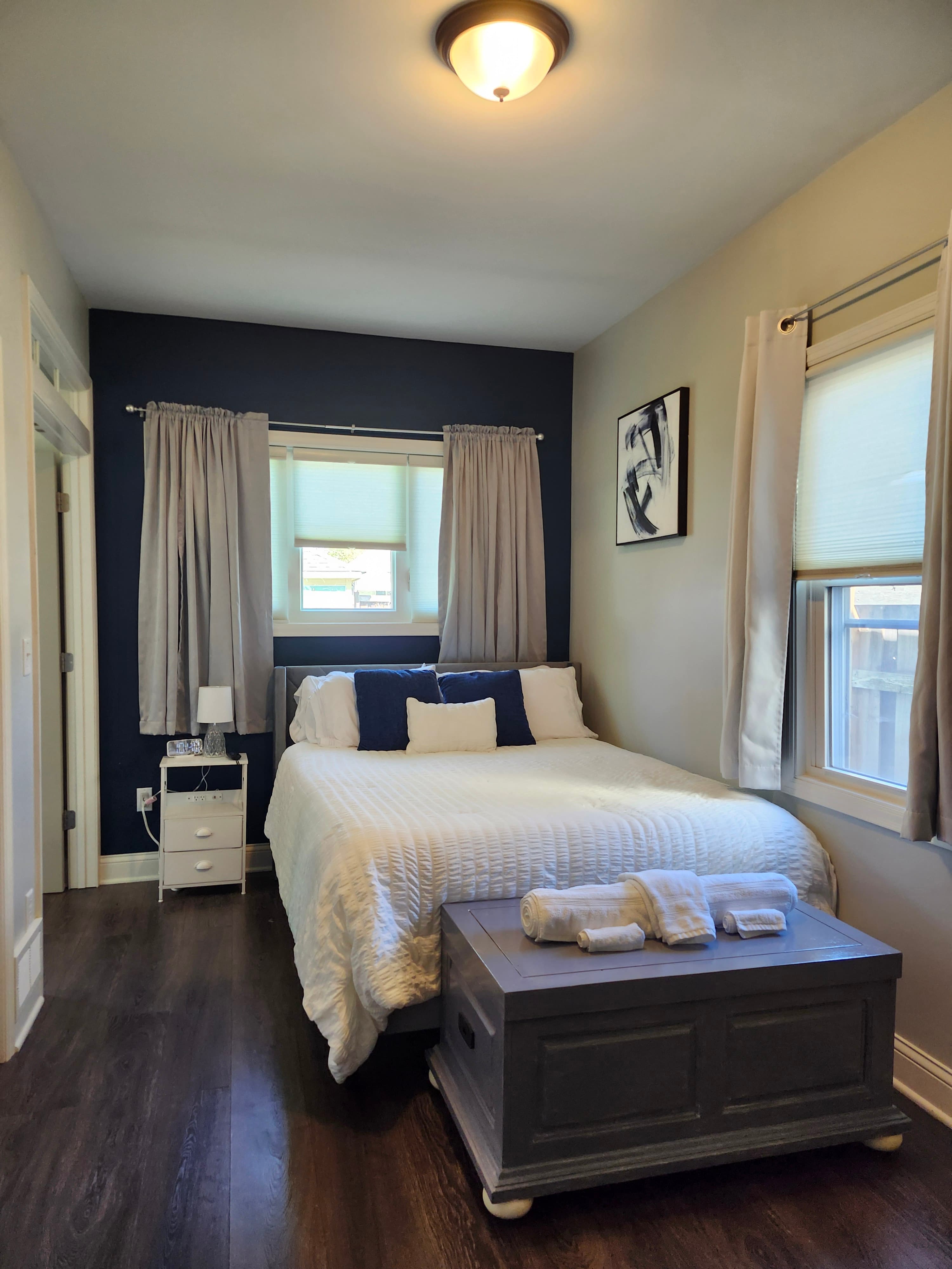 Queen bed with cooling memory foam topper