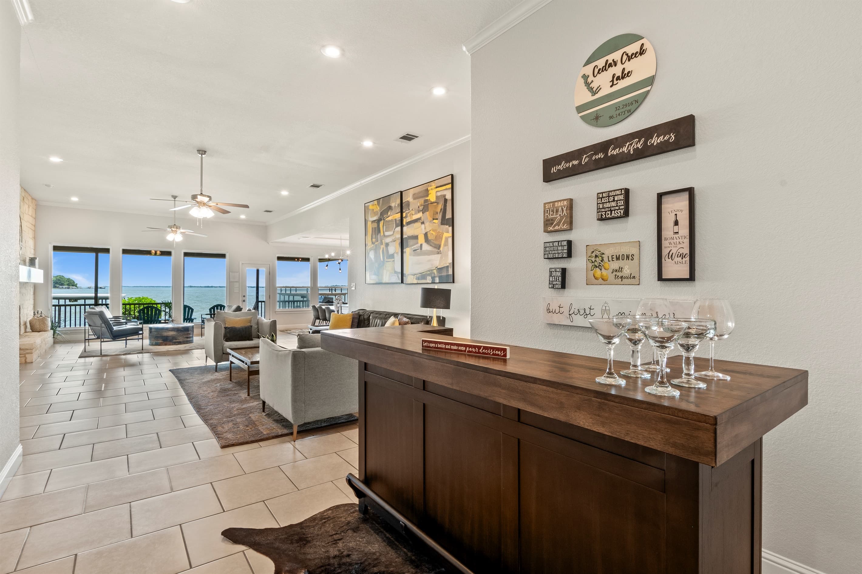 Self-serve bar with stunning open lake views—cheers to lakeside luxury!