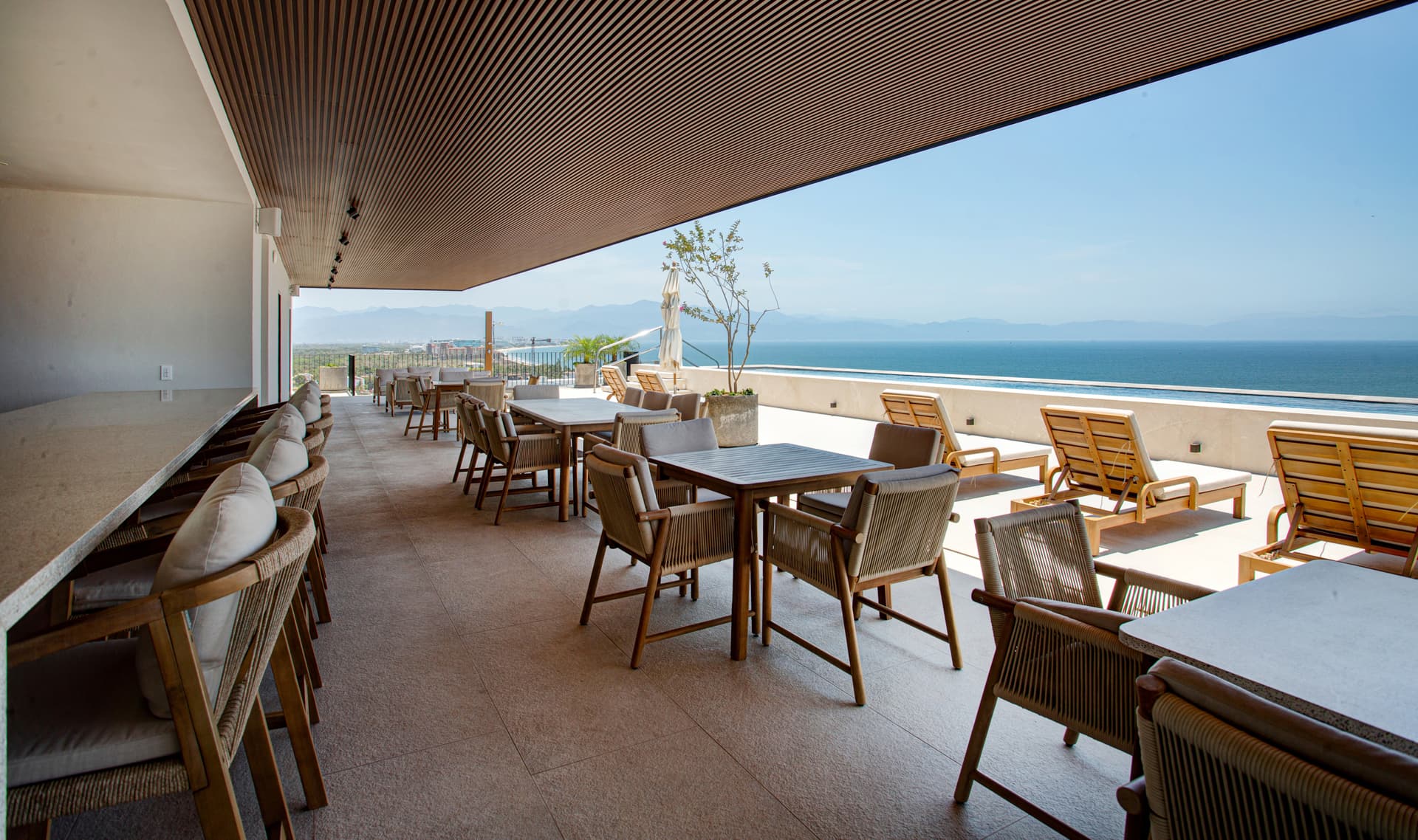 The rooftop is a vibrant social retreat with multiple lounge and dining areas—perfect for relaxing, enjoying a drink, sharing a meal, or getting a little work done with a view.