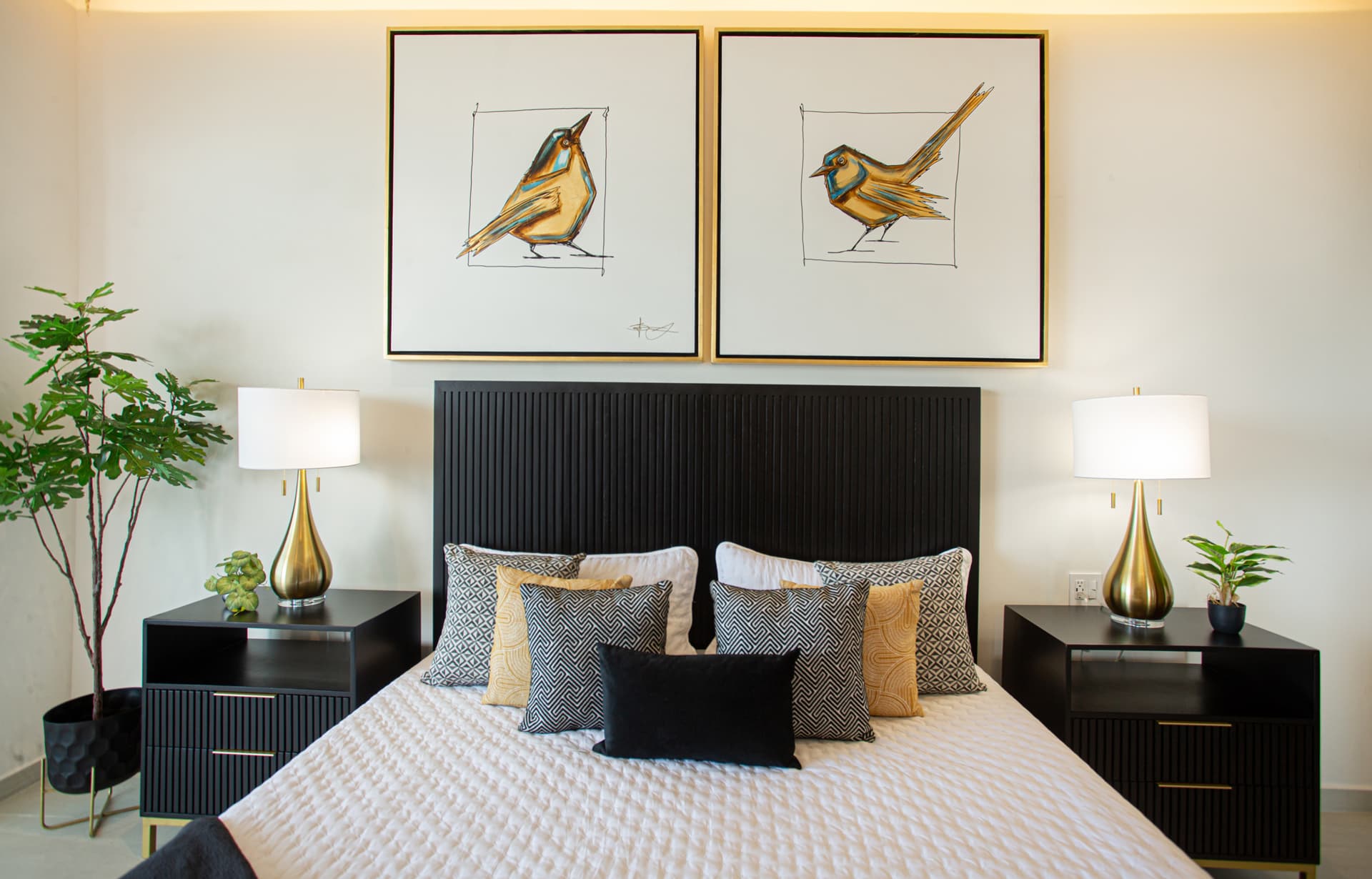 Primary Bedroom: Sleep well, wake inspired — the primary bedroom features stunning art, elegant nightstands, and refined finishes designed to refresh and recharge you for another perfect day in paradise.