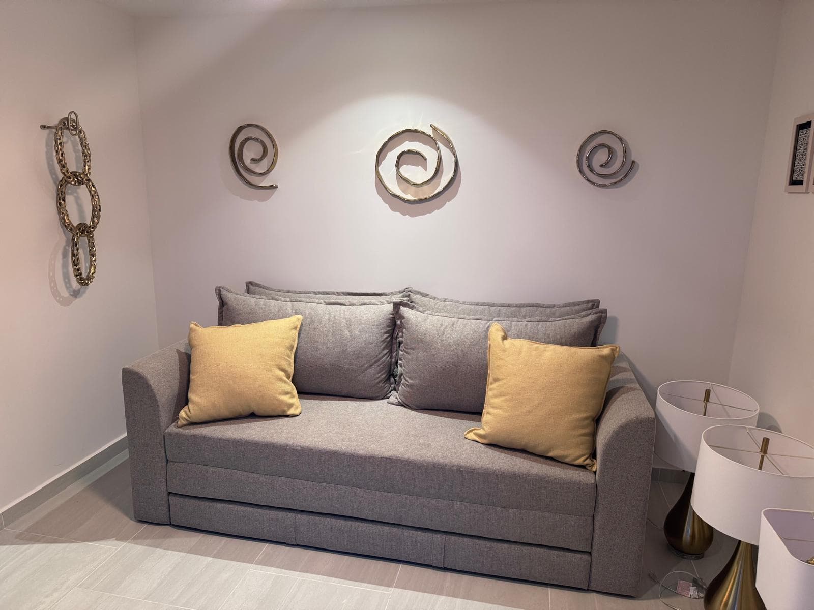 The study's sleeper sofa means there's always room for one more — a comfortable place to rest that tucks away beautifully when the day calls for work or streaming.