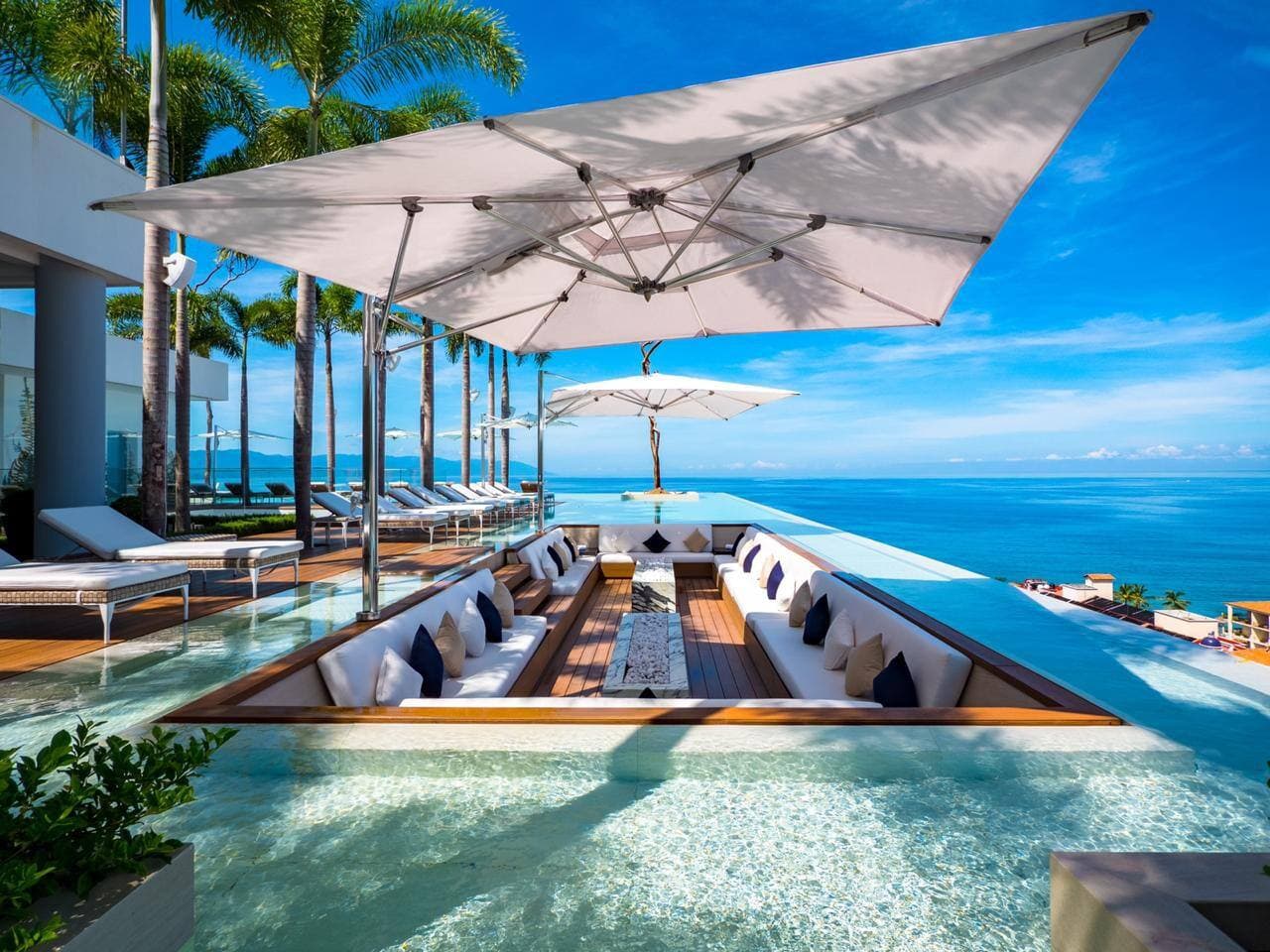 Rooftop Bar with Bartender serving drinks until 10PM daily.