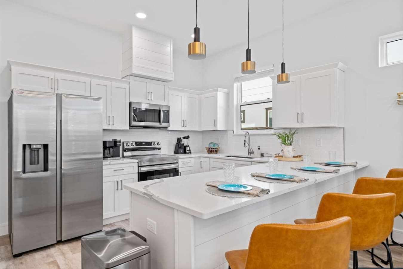 An updated kitchen with stainless steel appliances