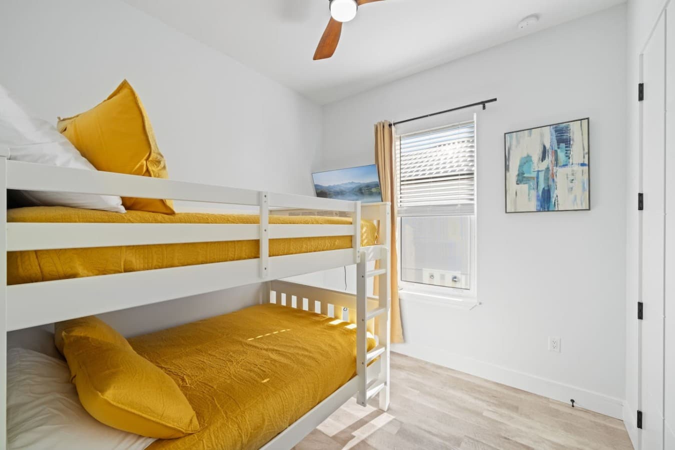 The fifth bedroom is a bunk room (upstairs) with double beds (can sleep 2 on top and 2 on bottom)