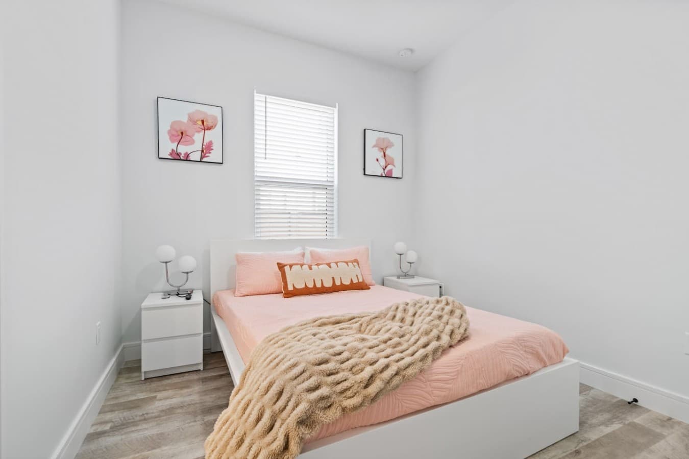 One of two bedrooms located downstairs in the home with a shared bathroom