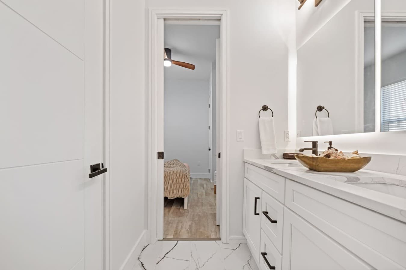 One side of the connecting jack and jill bathroom downstairs