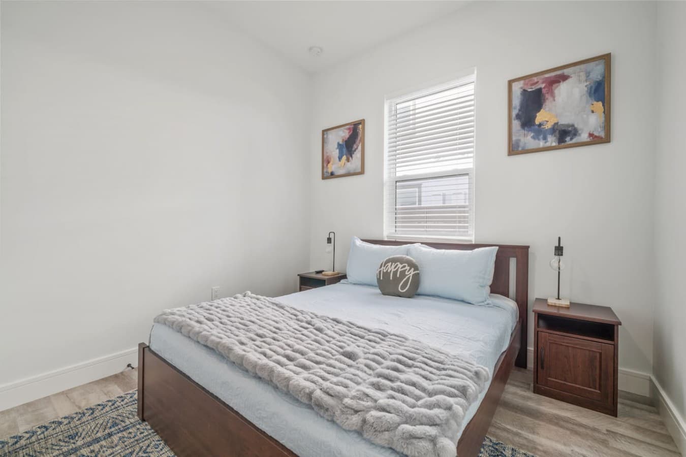Queen bedroom located on the main level of the home with a jack and jill bathroom