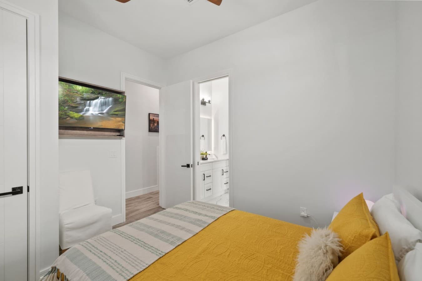 The other queen bedroom located on the main level of the home and connected by jack and jill bathroom