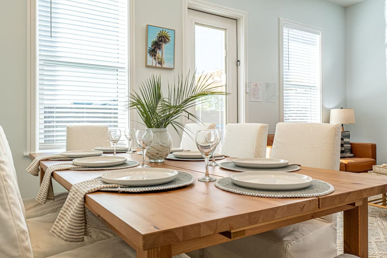 A large dining table that can seat 8