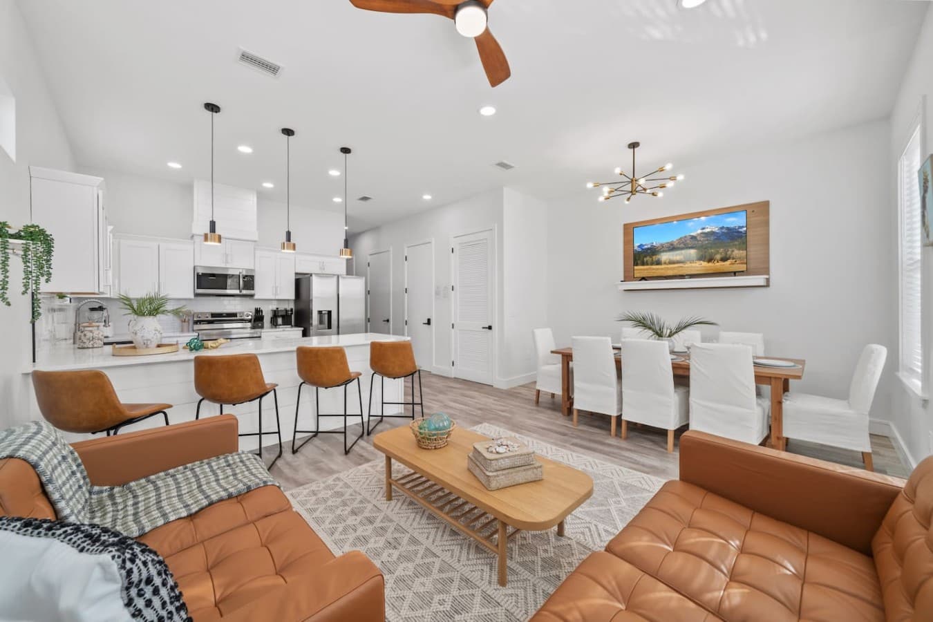 An open floor plan with kitchen, dining and living room located next to each other