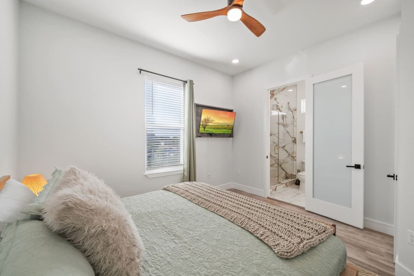 The master bedroom located upstairs in the home with en suite bathroom