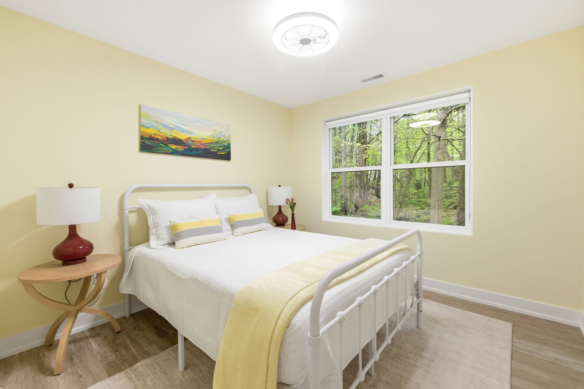 Bedroom Five has a queen bed overlooking the ravine.