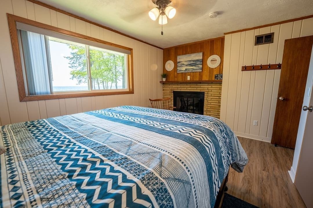 Second bedroom includes electric fireplace
