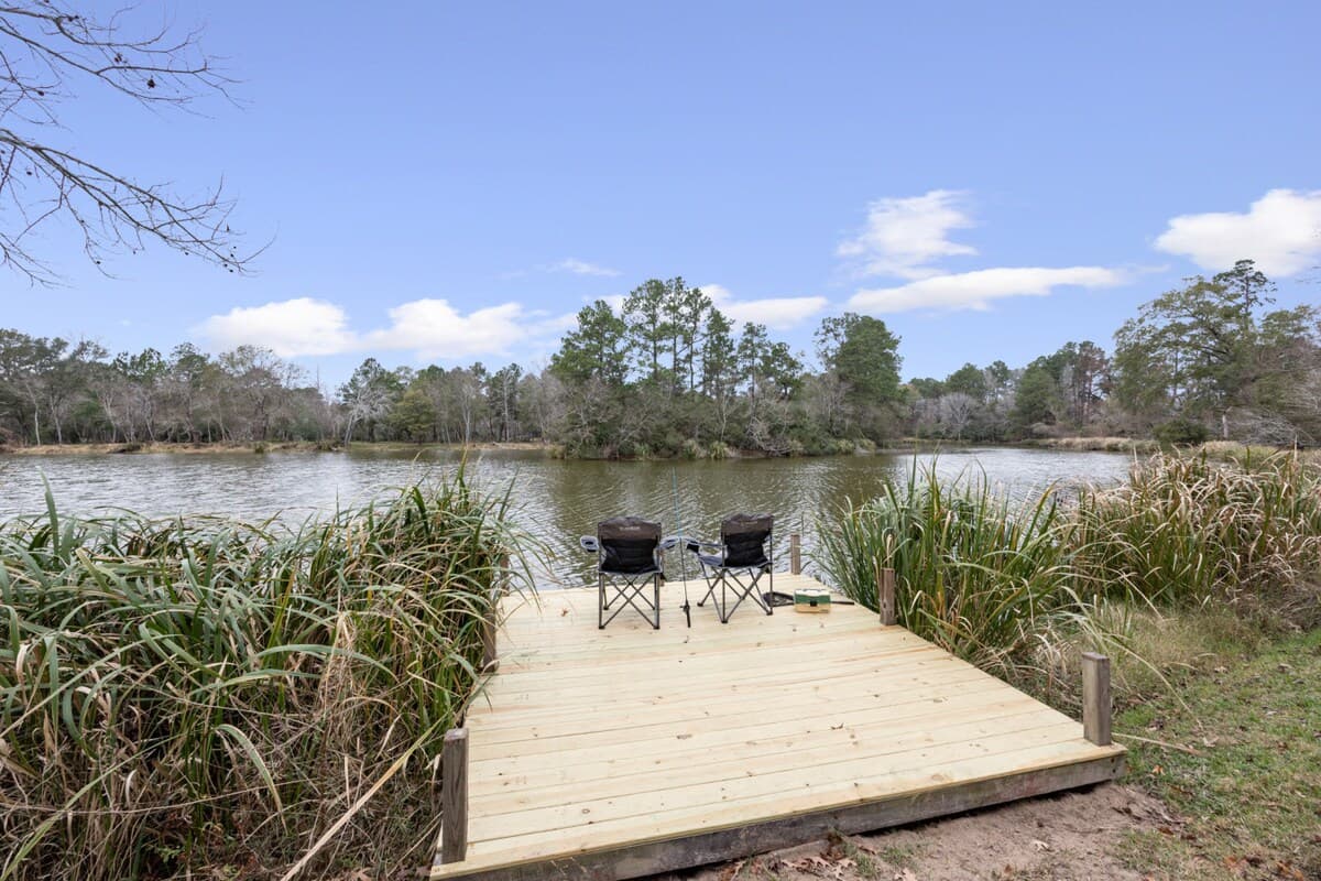 Private dock with peaceful water views—perfect for fishing, relaxing, or watching the sky glow at sunset.