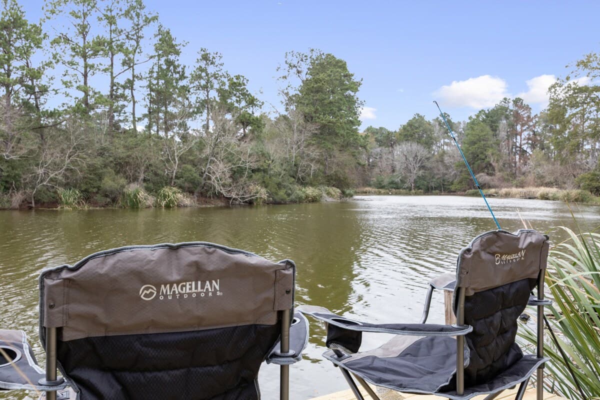 Enjoy peaceful lake views from the dock, a perfect spot to unwind, take in the scenery, and later watch the sun set over the water.